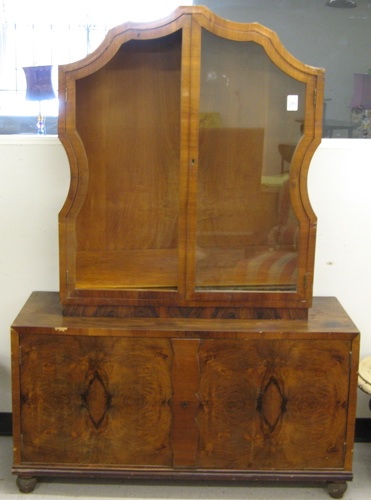 Appraisal: A MAHOGANY AND BURL WALNUT DISPLAY CABINET ON CUPBOARD German