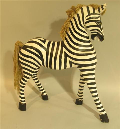 Appraisal: WHIMSICAL PAINTED WOOD MODEL OF A ZEBRA The beast carved