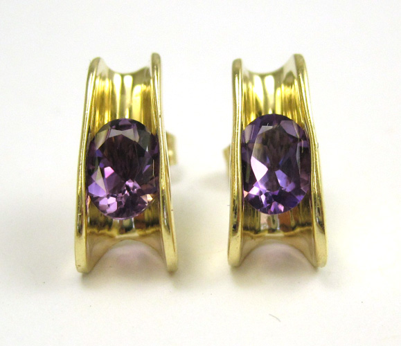 Appraisal: PAIR OF AMETHYST AND YELLOW GOLD EARRINGS each k gold