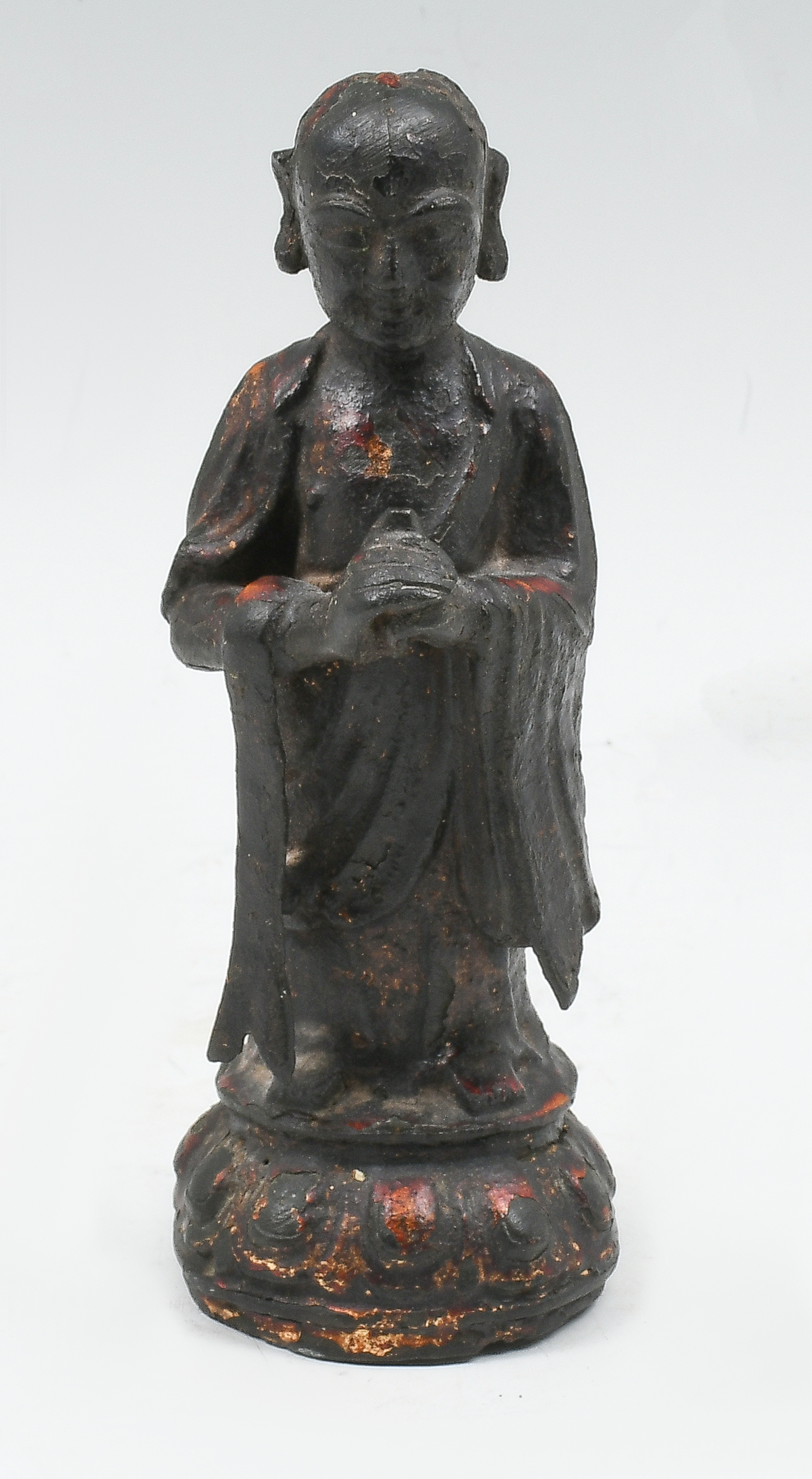 Appraisal: CHINESE TIBETAN BRONZE SCHOLAR Early altar bronze of a Tibetan