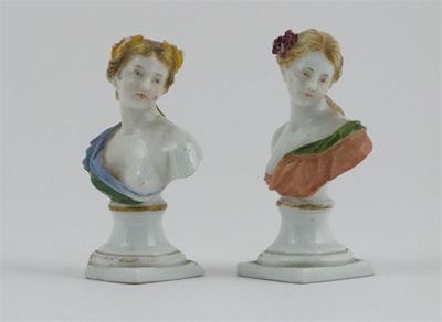 Appraisal: Two miniature Meissen busts of Classical maidens with flowers in