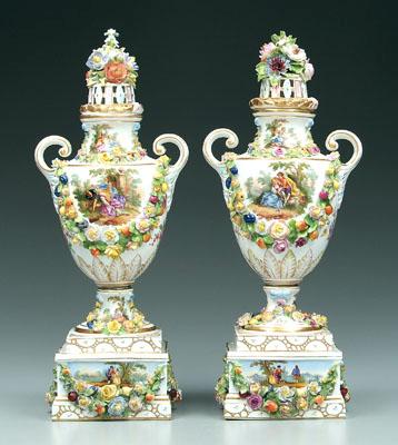 Appraisal: Pair porcelain lidded urns hand painted decoration with figures in