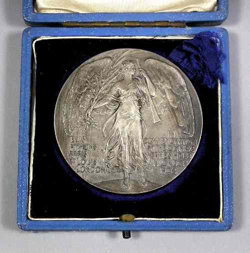 Appraisal: A London Olympics Judge's commemorative medal by P Vaughton after