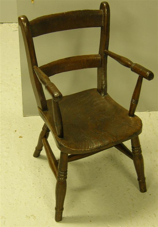 Appraisal: Child's oak bar back armchair th century with turned arms