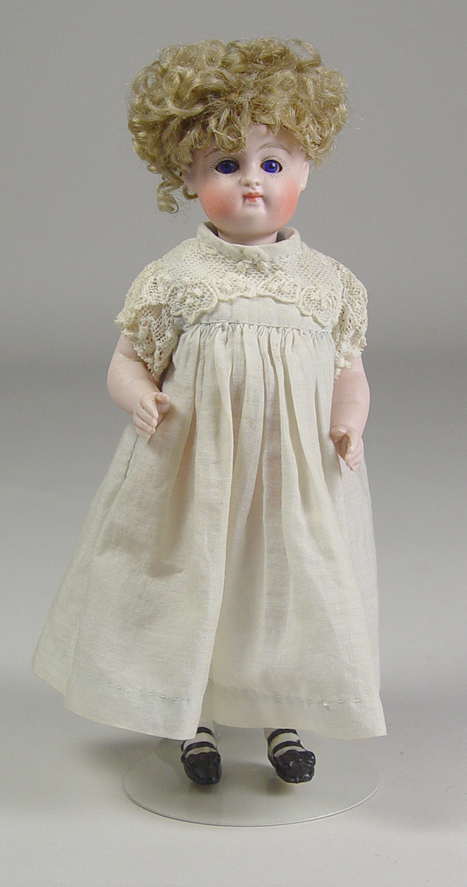 Appraisal: German All-Bisque Girl Early face with cobalt sleep glass eyes