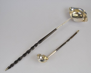 Appraisal: A George III silver toddy ladle with twisted whalebone handle