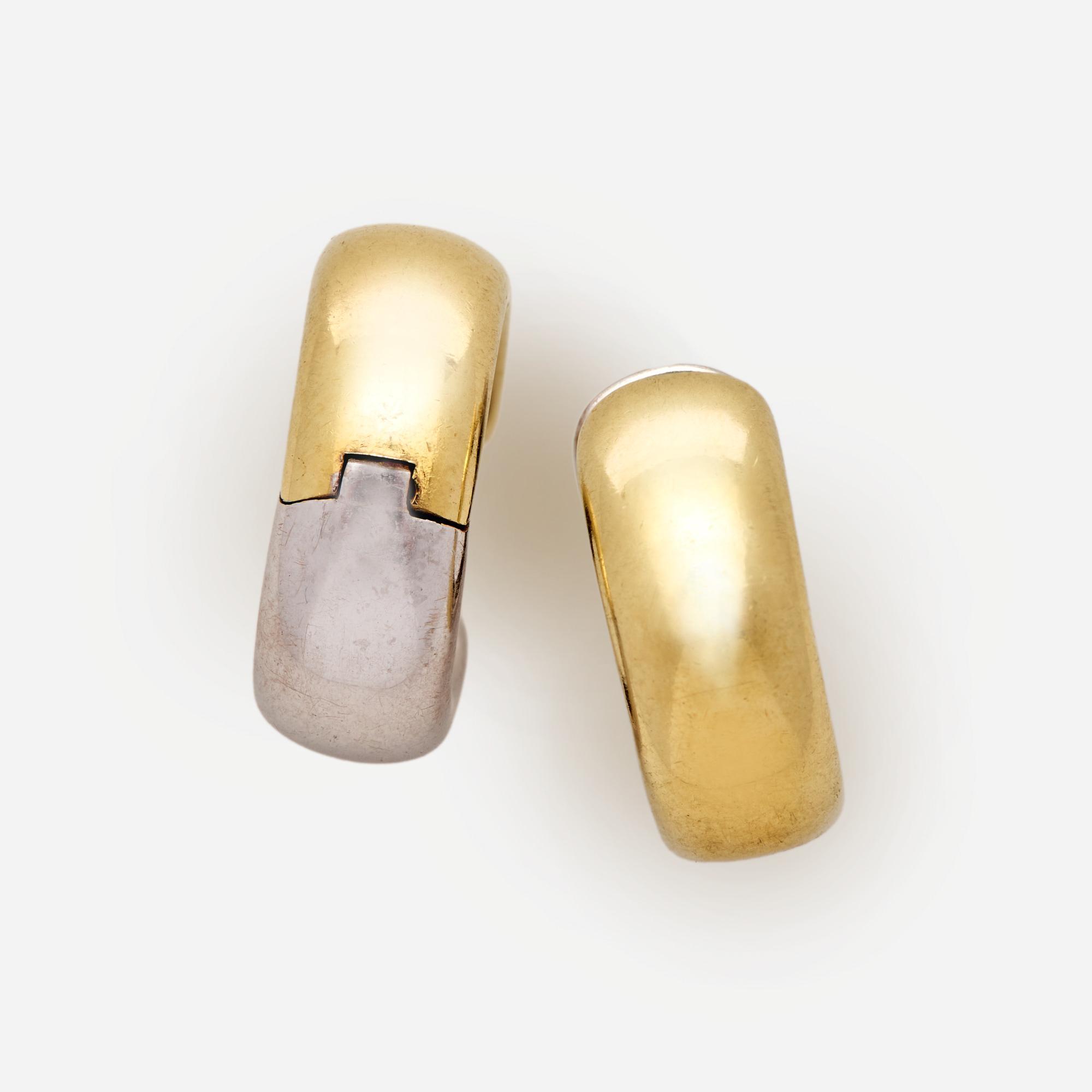 Appraisal: REVERSIBLE K WHITE OR YELLOW GOLD HUGGIE EARRINGS A pair