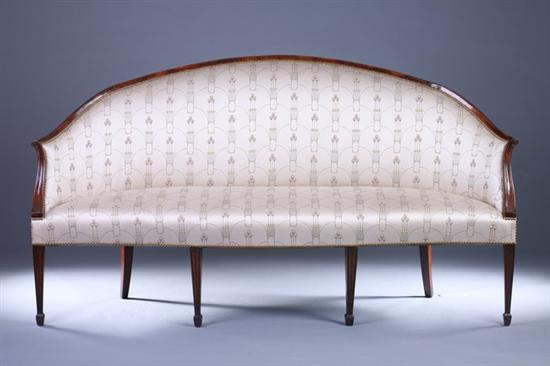 Appraisal: NEOCLASSICAL STYLE MAHOGANY SETTEE th Century With nailed upholstery Bowed