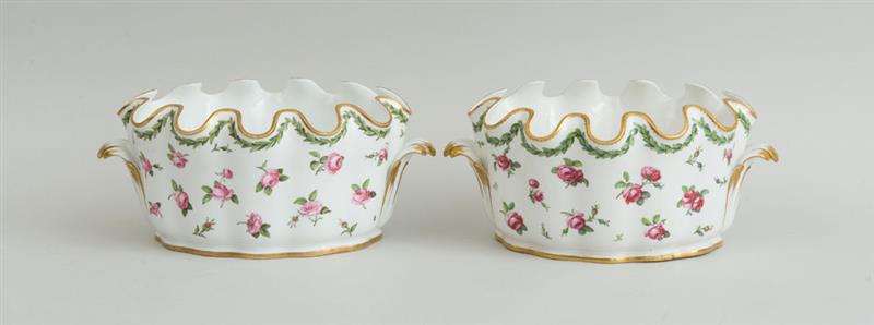 Appraisal: PAIR OF SILVER-FORM PORCELAIN OVAL VERRI RES Marked in underglaze