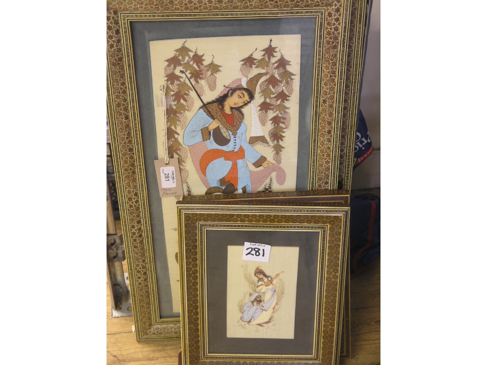 Appraisal: A pair of Middle-Eastern paintings each a figure group within