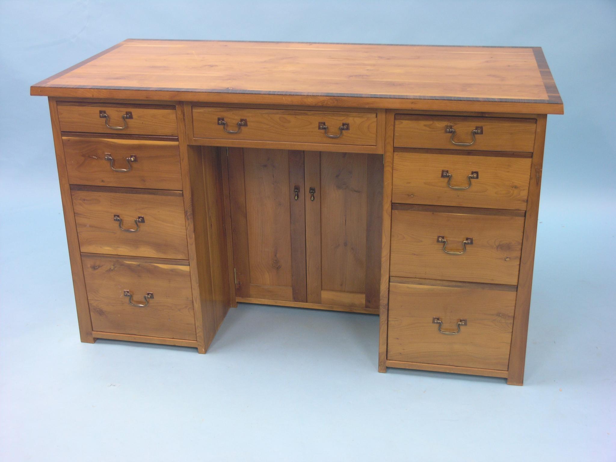 Appraisal: A solid yew desk hand-made by B J Devitt-Spooner Angmering