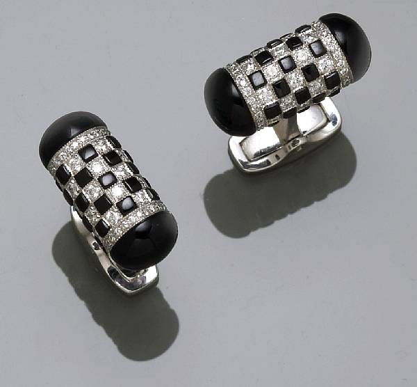 Appraisal: A pair of black onyx and diamond cufflinks estimated total