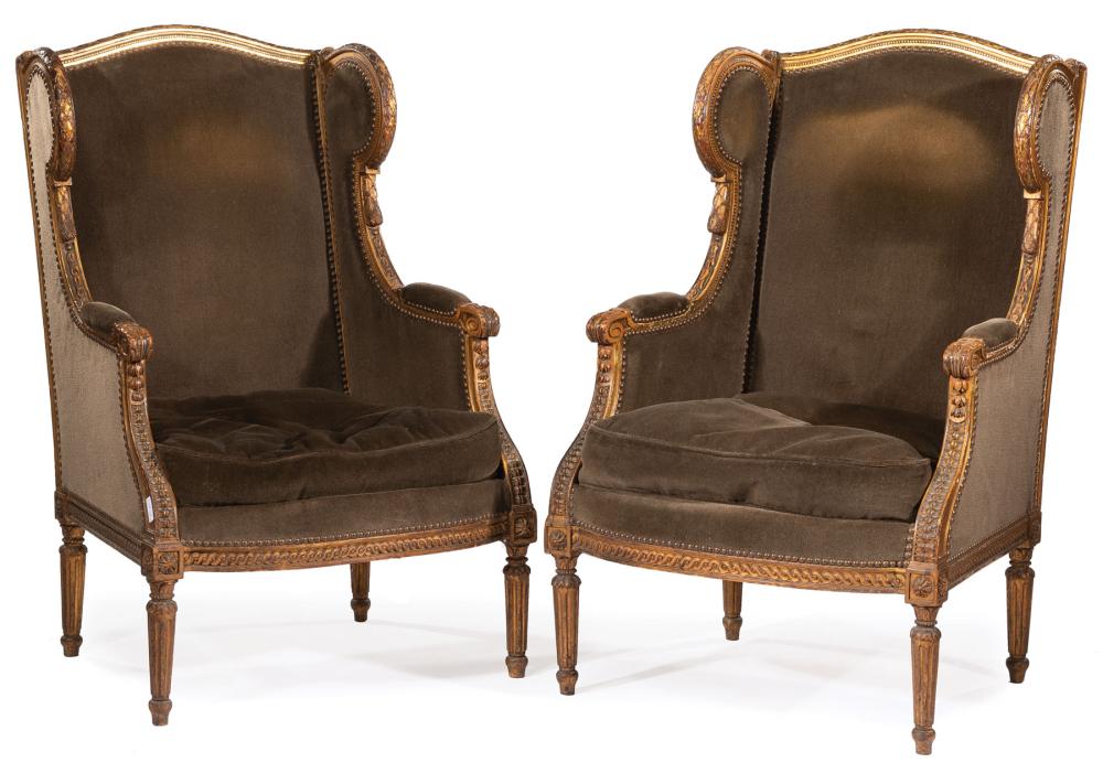 Appraisal: Pair of Louis XVI-Style Carved and Parcel Gilt Fruitwood Bergeres