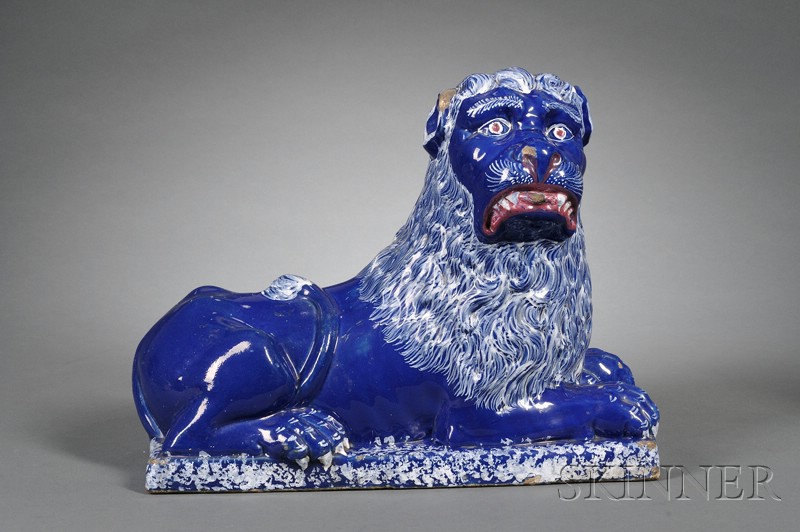 Appraisal: Faience Model of a Recumbent Lion France th century modeled