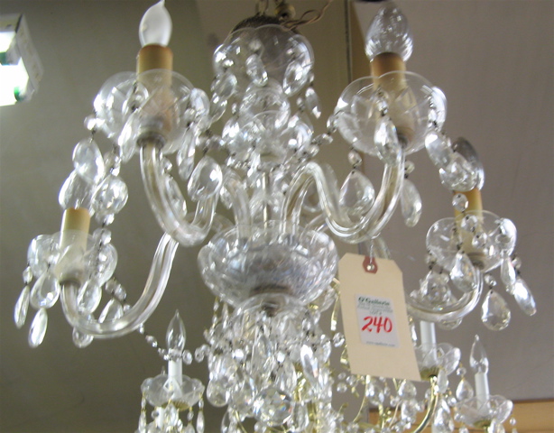 Appraisal: FIVE-LIGHT CRYSTAL CHANDELIER hung overall with faceted pear-shaped crystal drops