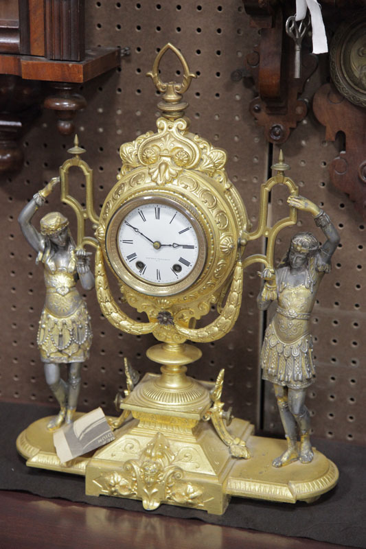 Appraisal: SETH THOMAS FIGURAL MANTEL CLOCK Eight day time strike clock