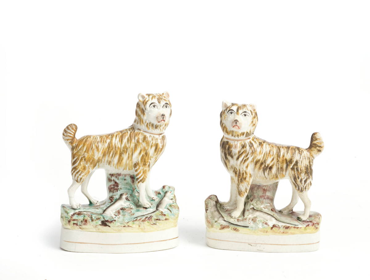 Appraisal: PAIR OF STAFFORDSHIRE MODELS OF TERRIERS MID-NINETEENTH CENTURY Each coat