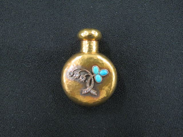 Appraisal: Gold Diamond and Turquoise Perfume Bottle handhammered floral th century