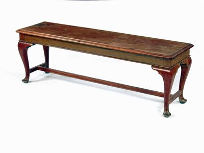 Appraisal: A walnut bench the rectangular moulded edge top on cabriole