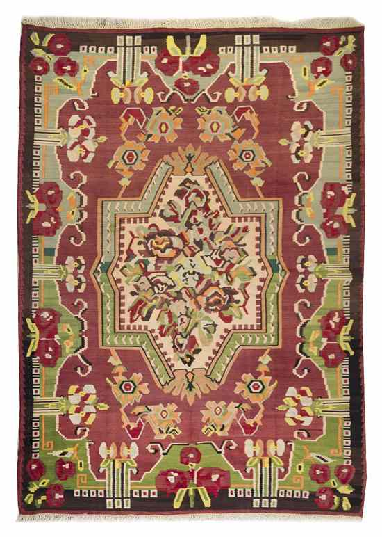 Appraisal: A Turkish Kilim Wool Rug having a central foliate medallion