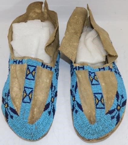 Appraisal: POSSIBLY LATE TH CENTURY PAIR OF PLAINS INDIANBEADED MOCCASINS WITH