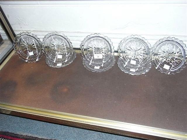 Appraisal: A SET OF EIGHT IRISH GLASS SMALL SHALLOW PLATES each