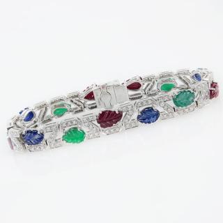 Appraisal: Carat Carved Emerald Carat Carved Sapphire Carat Carved Ruby Carat