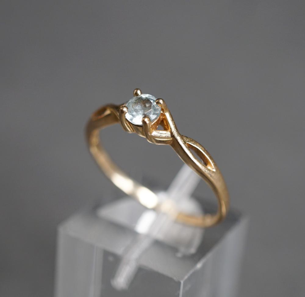 Appraisal: -KARAT YELLOW-GOLD AND BLUE TOPAZ RING GROSS DWT SIZE -Karat