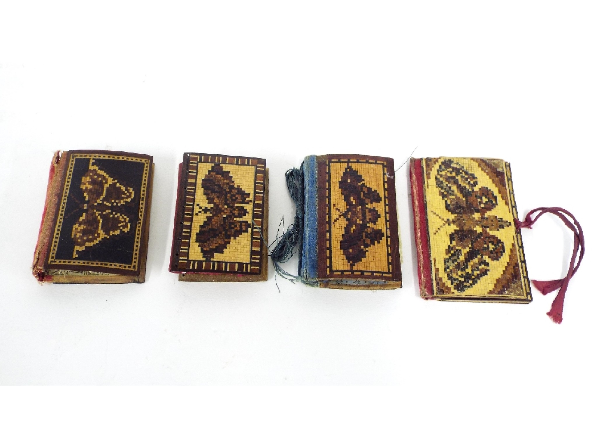 Appraisal: Four Tunbridge Ware needle cases all decorated with butterflies and