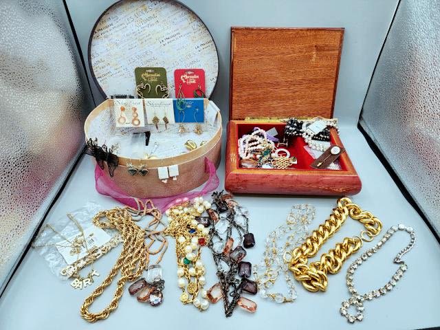 Appraisal: Large lot of costume jewelry and jewelry boxes Includes pairs