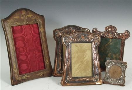 Appraisal: ART NOUVEAU GROUP OF STRUT PHOTO FRAMES CIRCA plated metal