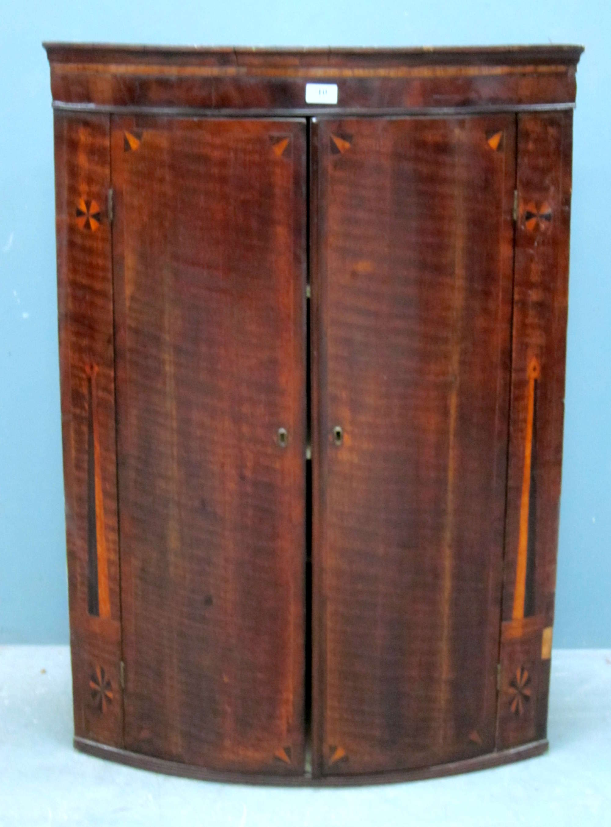 Appraisal: Oak wall hanging bowfront corner cupboard with two doors and