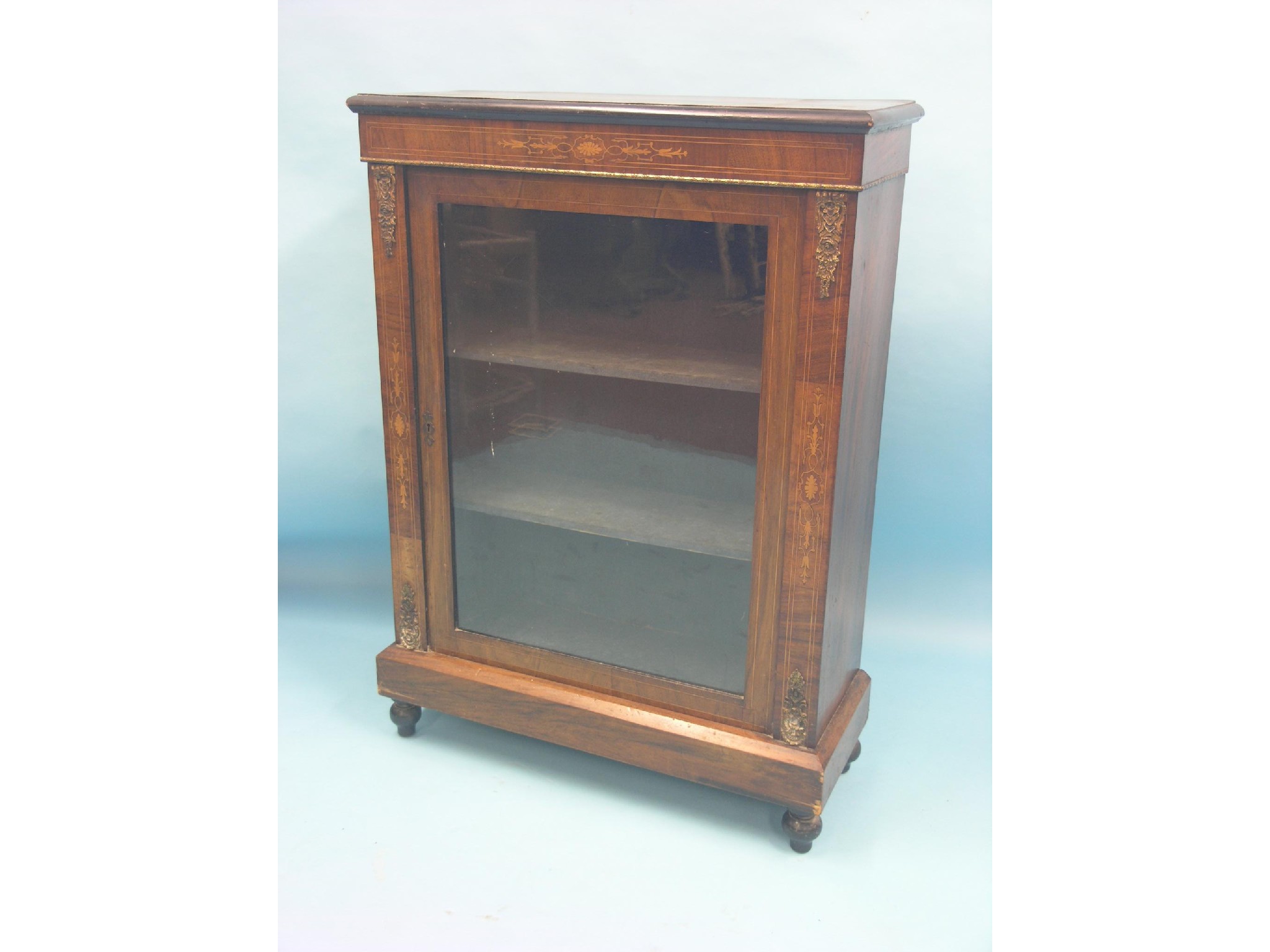 Appraisal: A Victorian inlaid walnut display cabinet with ormolu mounts single