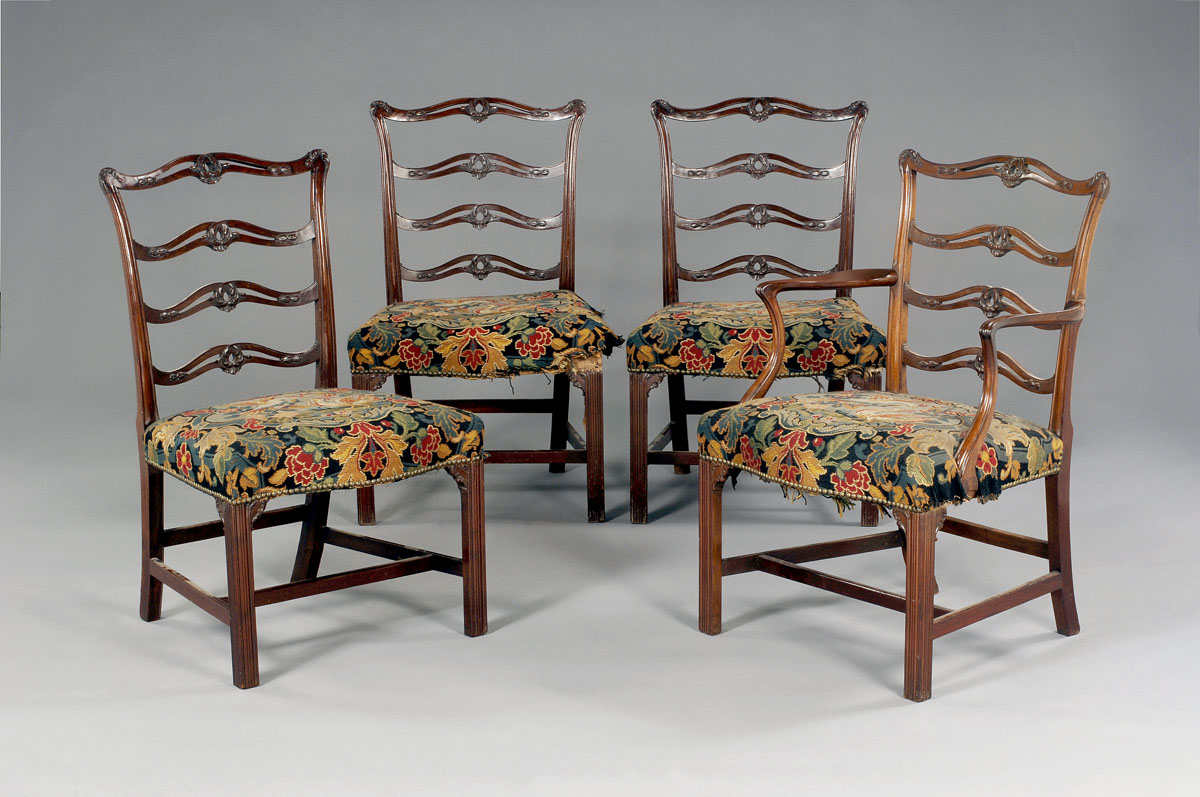 Appraisal: SET OF FOUR ENGLISH CHIPPENDALE CARVED MAHOGANY LADDERBACK CHAIRS Consisting