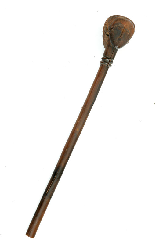 Appraisal: FIGURAL STAFF Angola - wood Round staff topped by a