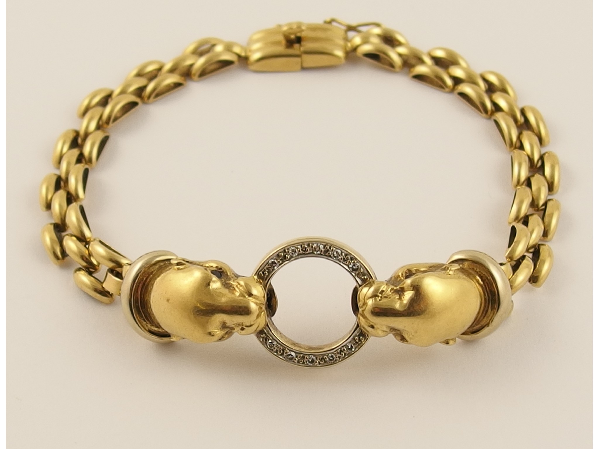 Appraisal: An ct gold leopard head braceletthe yellow gold leopards are