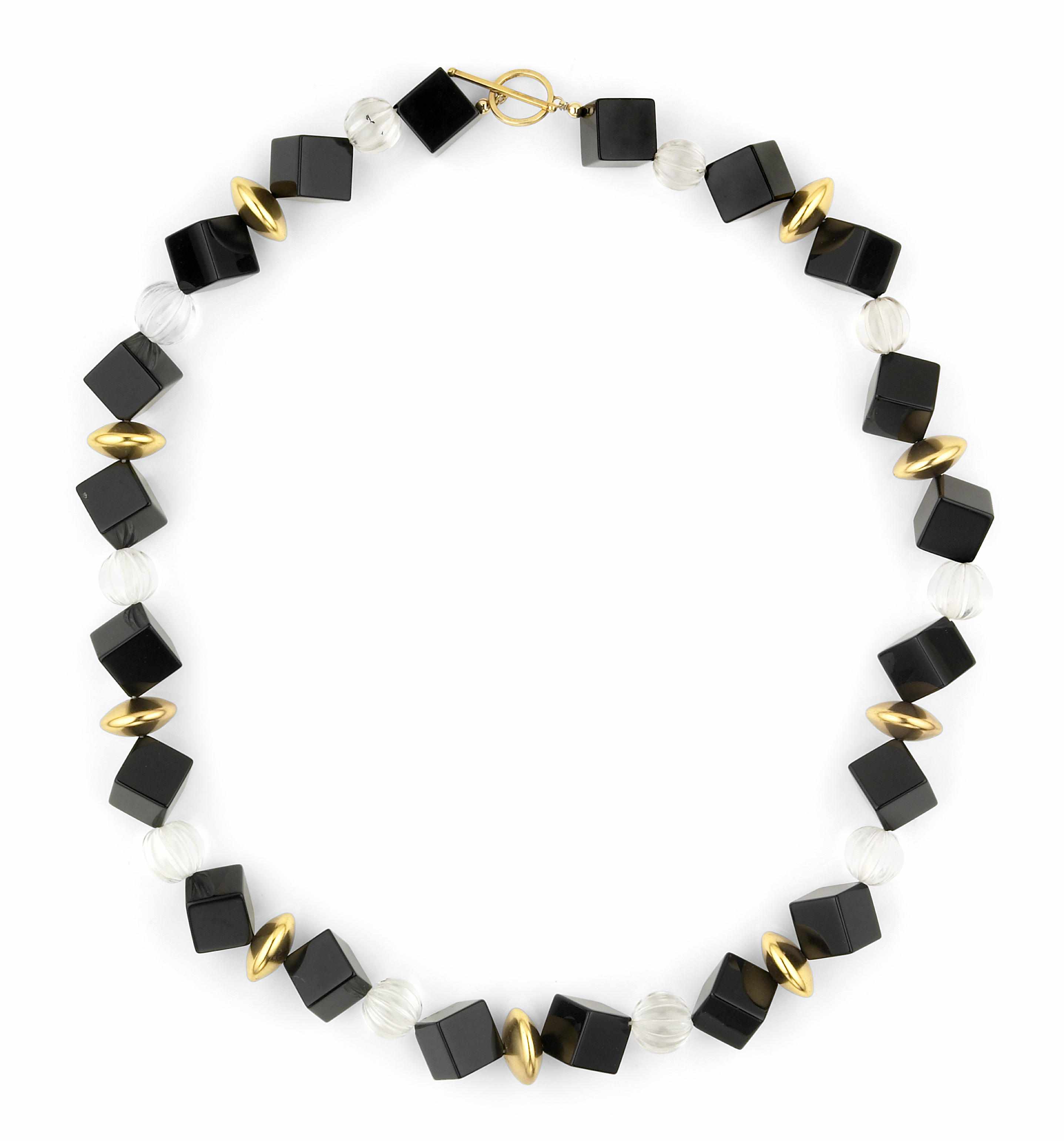 Appraisal: Tony Duquette American - sA black hardstone fluted crystal and