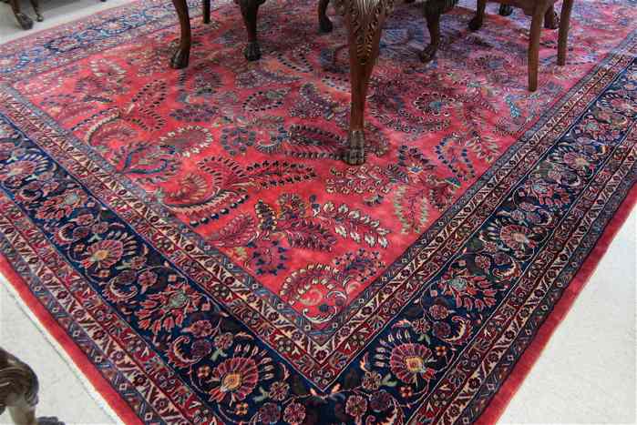 Appraisal: FINE HAND KNOTTED ORIENTAL CARPET Persian Sarouk design overall floral