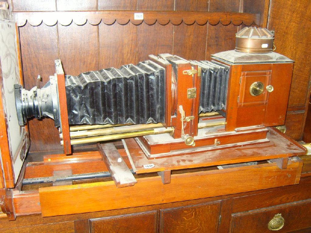 Appraisal: A large Victorian copy camera in mahogany with brass fittings