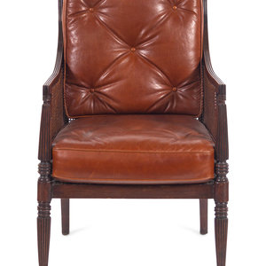 Appraisal: A William IV Style Mahogany Cane-and-Leather Upholstered Armchair Late th