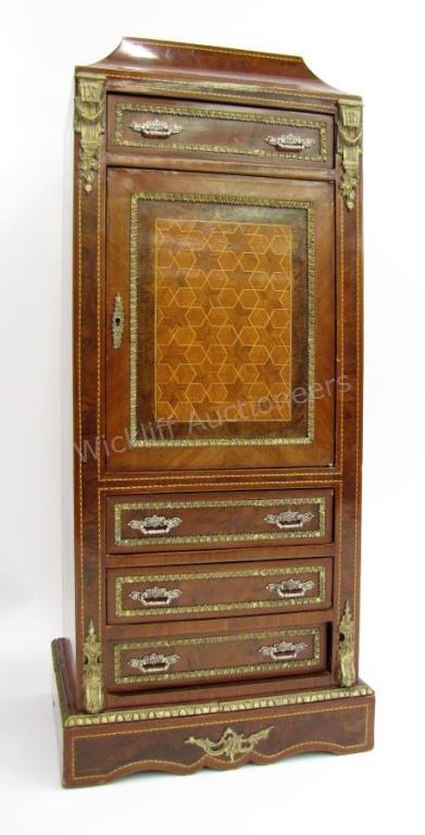 Appraisal: A period-style mahogany bar cabinet with mounted ormolu marquetry and