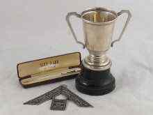 Appraisal: A mixed lot comprising a silver trophy cup on stand