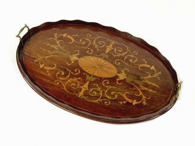 Appraisal: A late Victorian oval mahogany and marquetry inlaid tray having