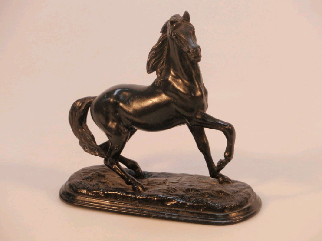 Appraisal: A Spelter figure of a prancing horse on cast base