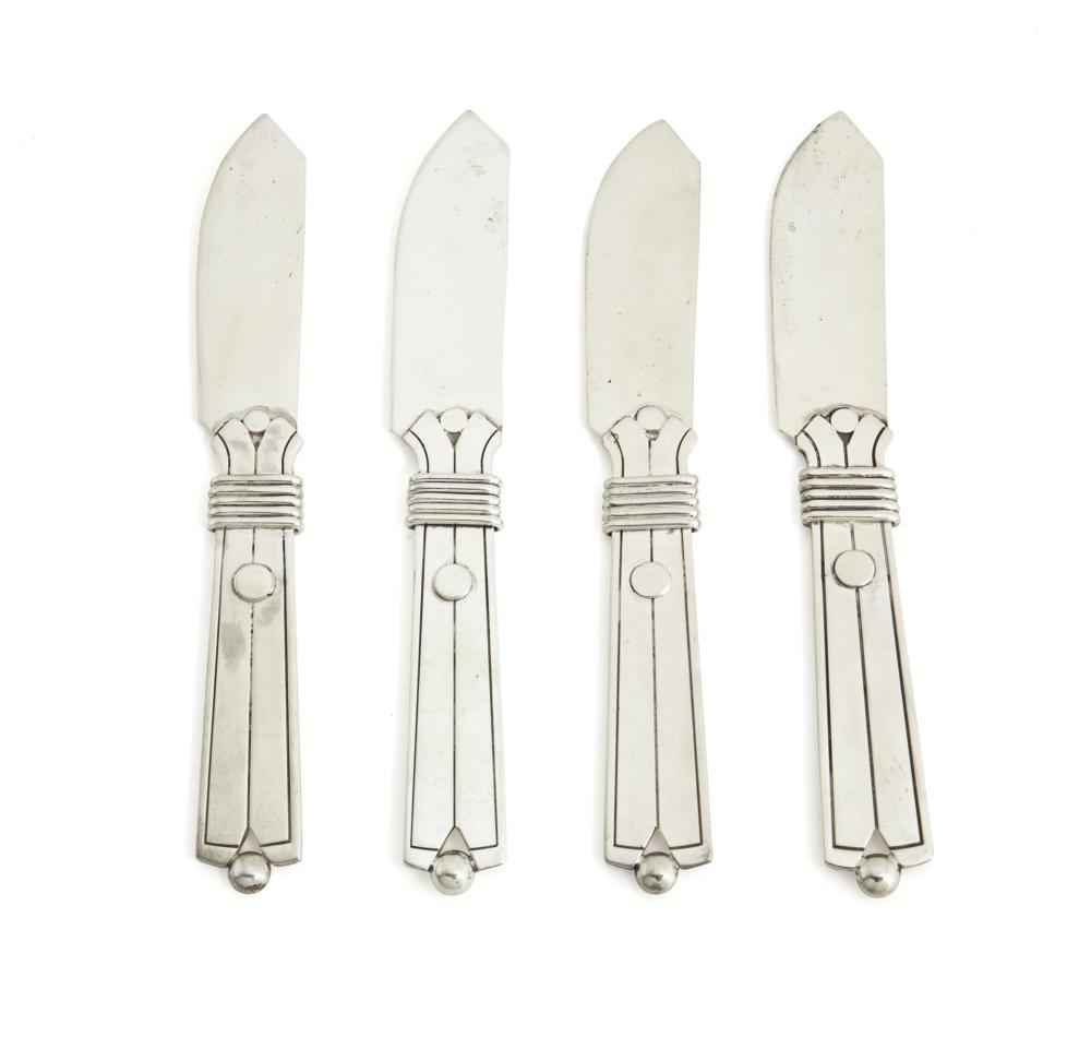 Appraisal: Twelve William Spratling Amarres Disco butter spreaders - Third Design