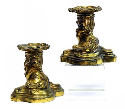 Appraisal: A PAIR OF GILT BRONZE CANDLESTICKS in the Louis XV