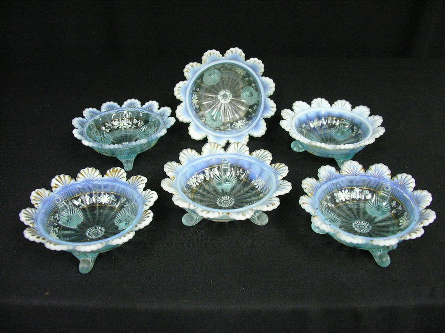 Appraisal: BLUE OPALESCENT FOOTED BOWLS Hand enameled flower decor Size