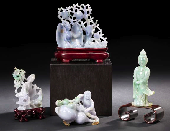 Appraisal: Two Chinese Carved Jadeite Figures consisting of an icy green