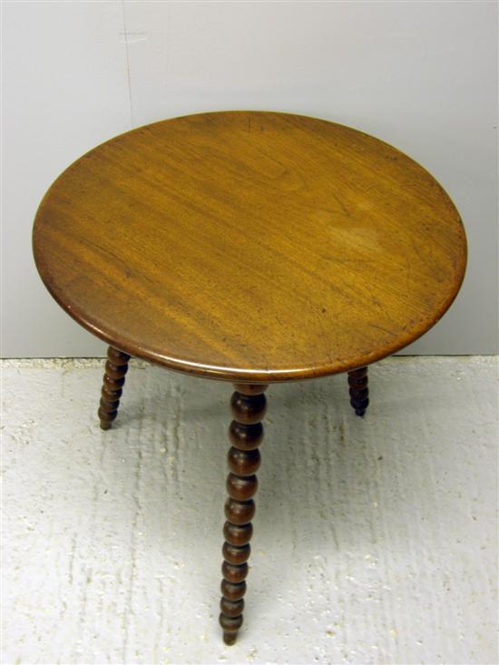 Appraisal: Early th century mahogany round cricket table on bobbin turned