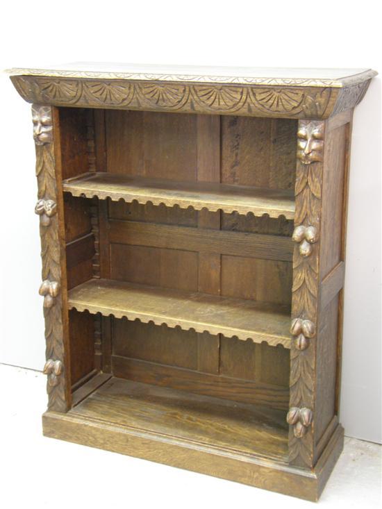 Appraisal: Early twentieth century carved oak open bookcase h w d